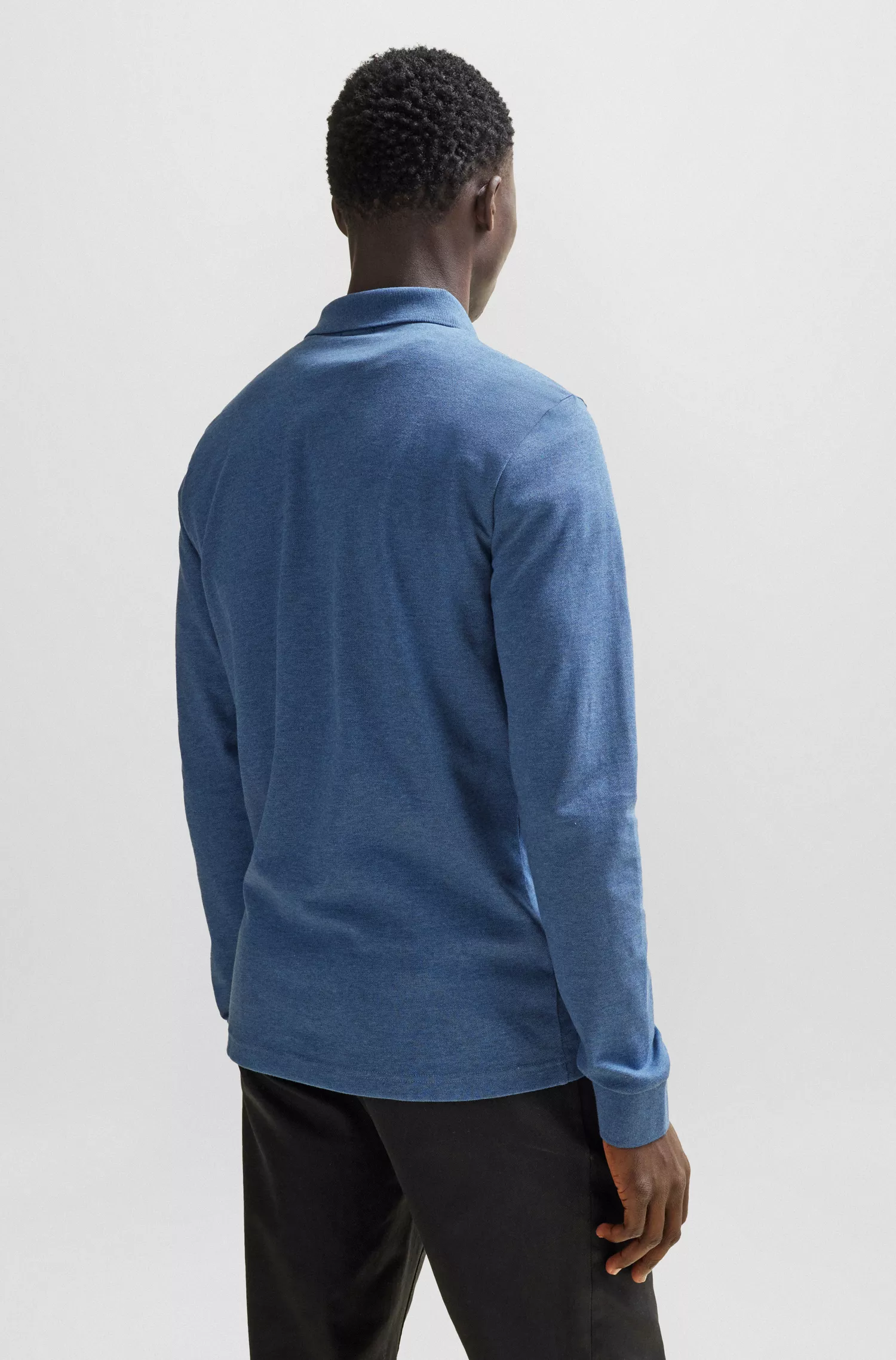 Camisa polo BOSS laranja em algodão stretch com etiqueta com o logotipo.