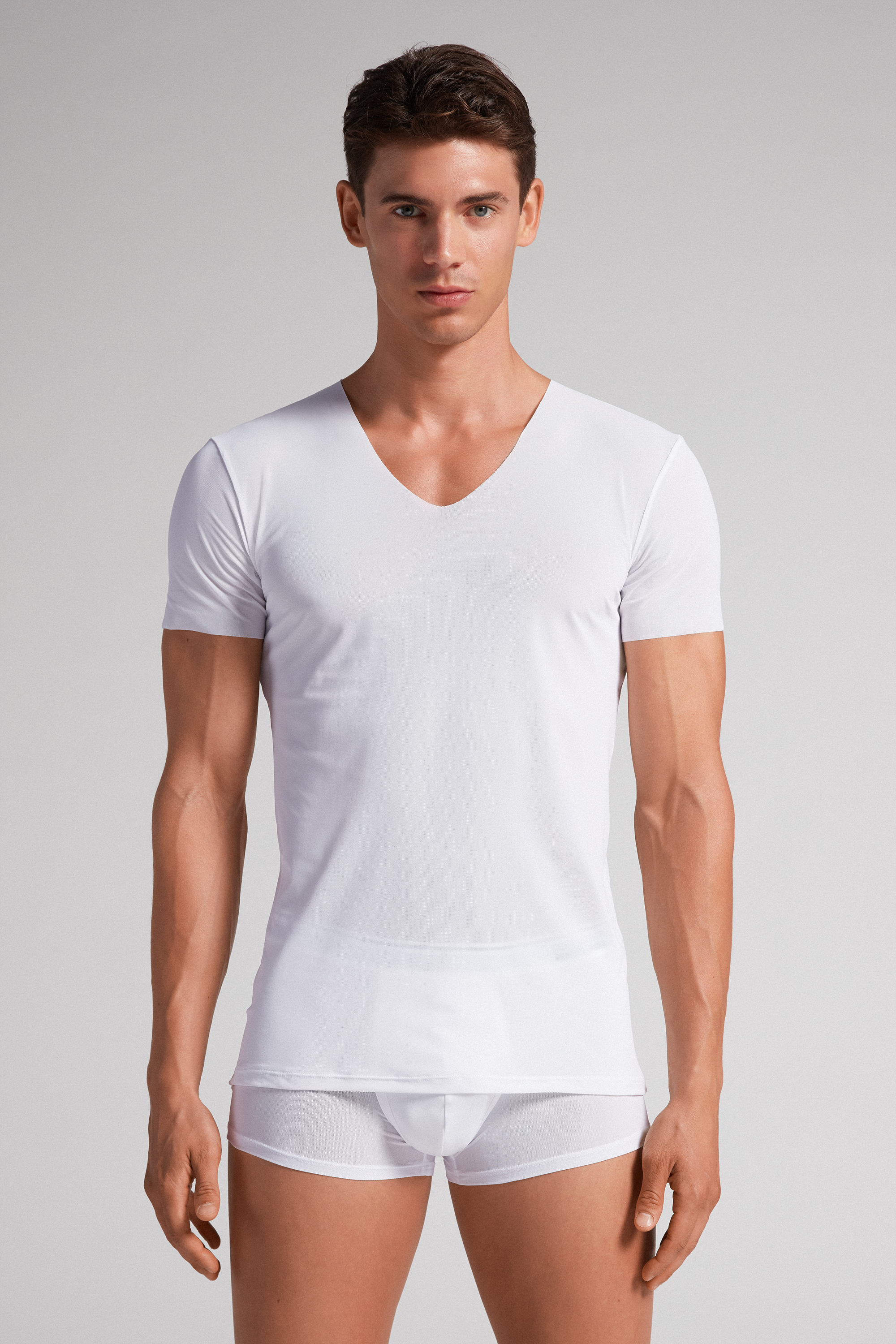 Camiseta de micromalha sem bainha