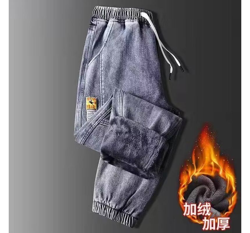 Nikoflin - Jeans met trekkoord en taps toelopende taille en gewassen panelen