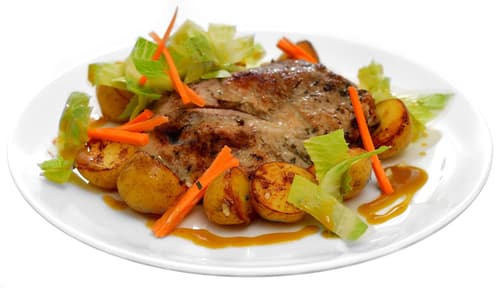 Schweinekotelett mit Honig-Senf-Dressing, Röstkartoffeln mit Knoblauch und Römersalat - 2 Portionen