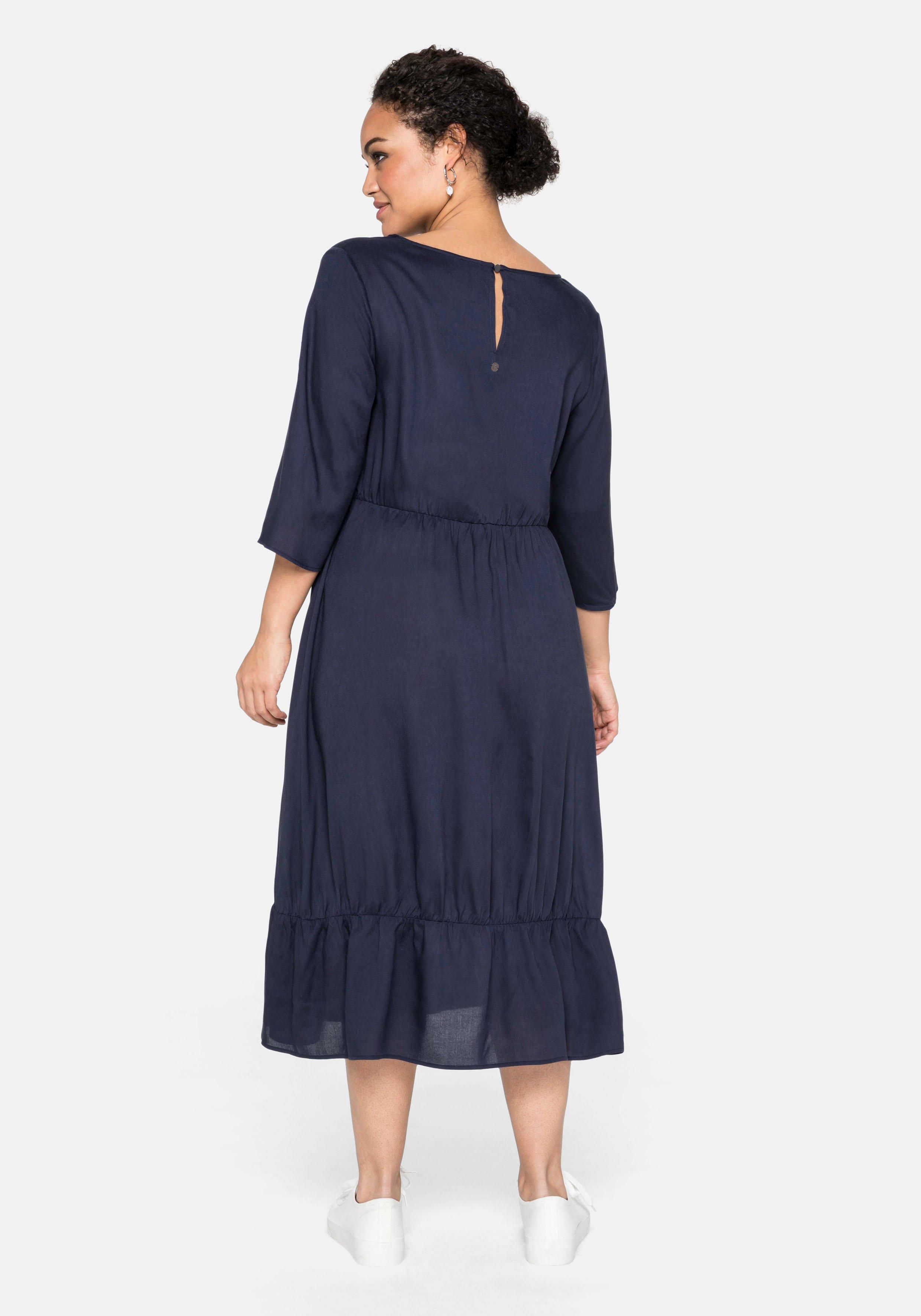 Kleid mit 3/4-Ärmel und Volant am Saum