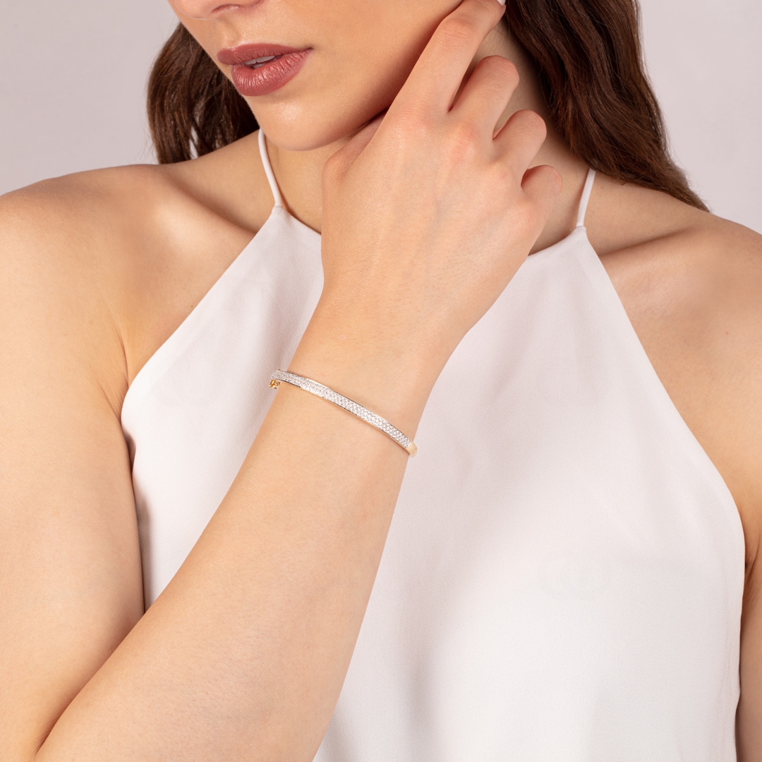 Armreif 750/18 K Gelbgold mit Diamanten 0.69 ct H/si