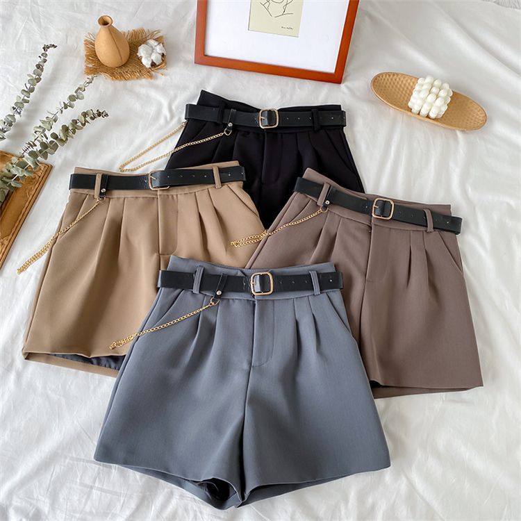 Fabricino - Korte jurk met hoge taille en ketting van imitatieleer