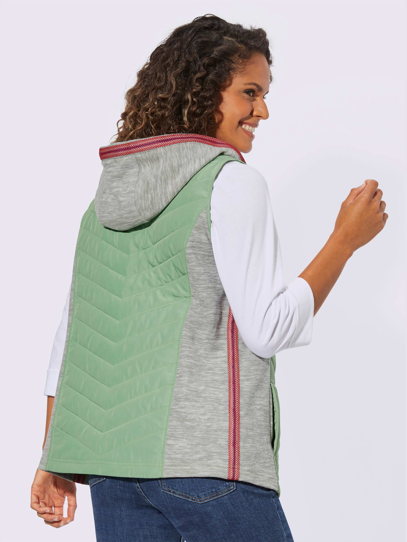 Gilet capuche avec coulisse et lien à nouer