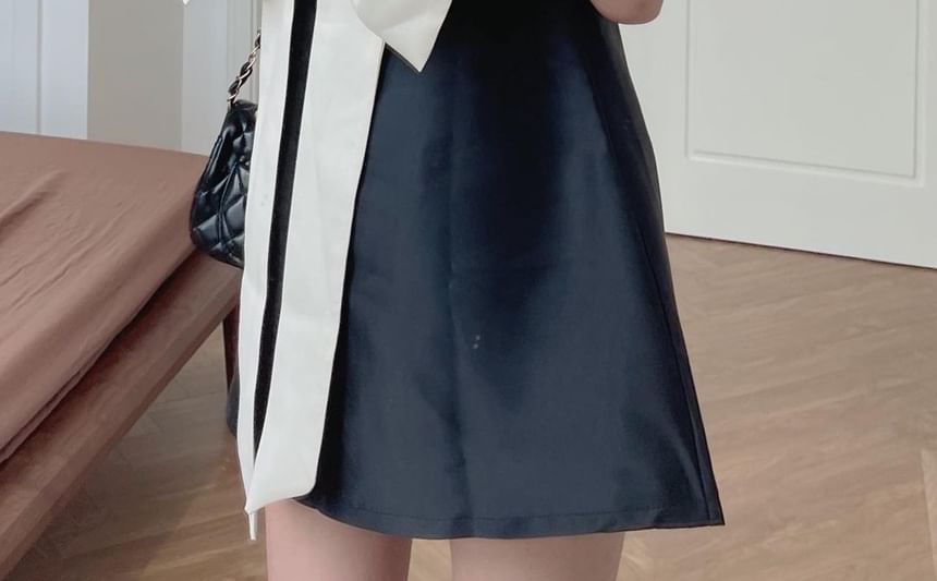 Coris - A-lijn jurk met korte mouwen en off-shoulder, tweekleurige strik