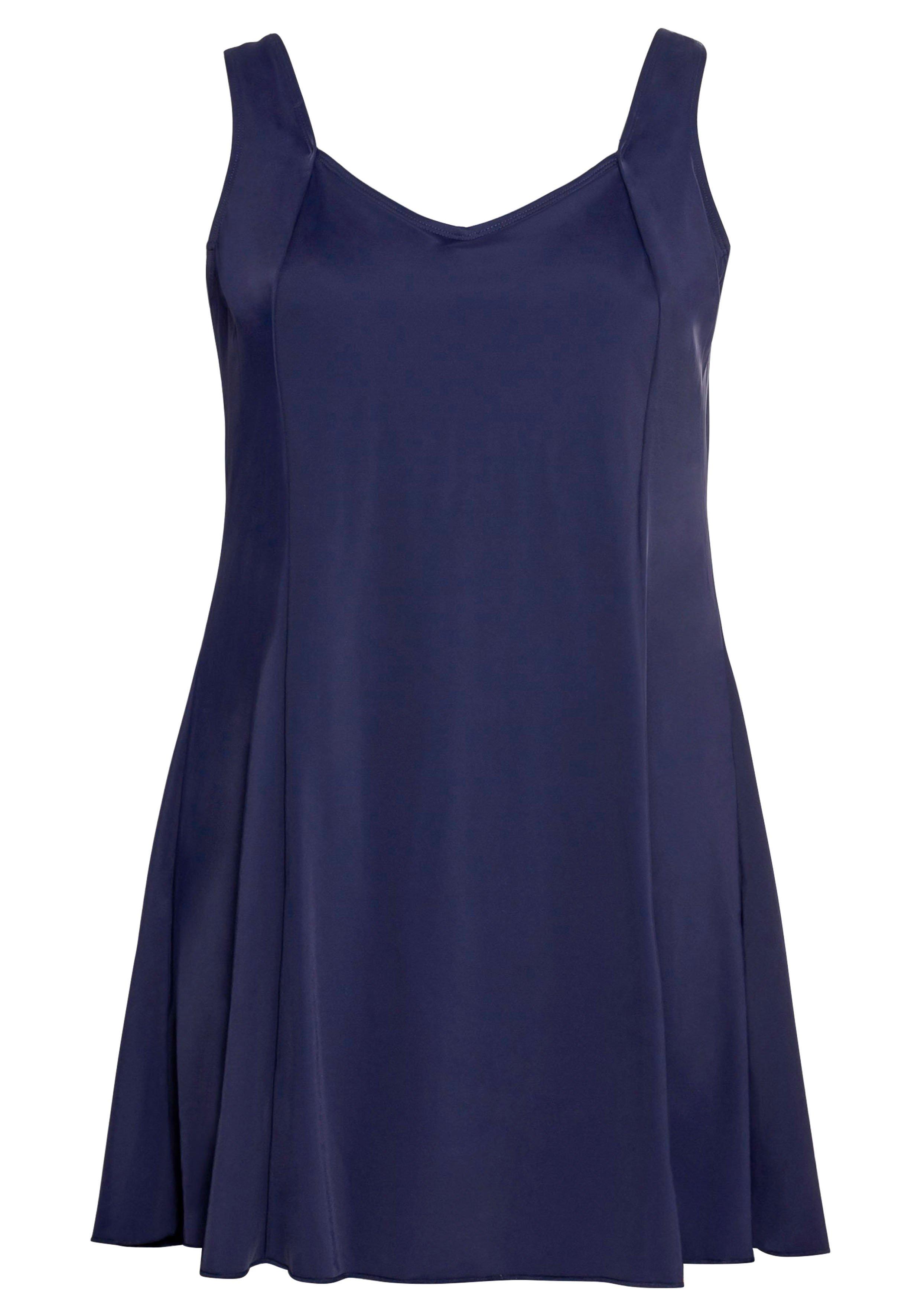 Badekleid mit V-Ausschnitt und integrierter Hose.