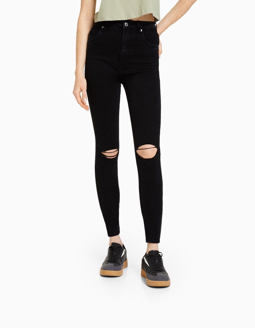 Calça jeans skinny de cintura super alta e rasgada