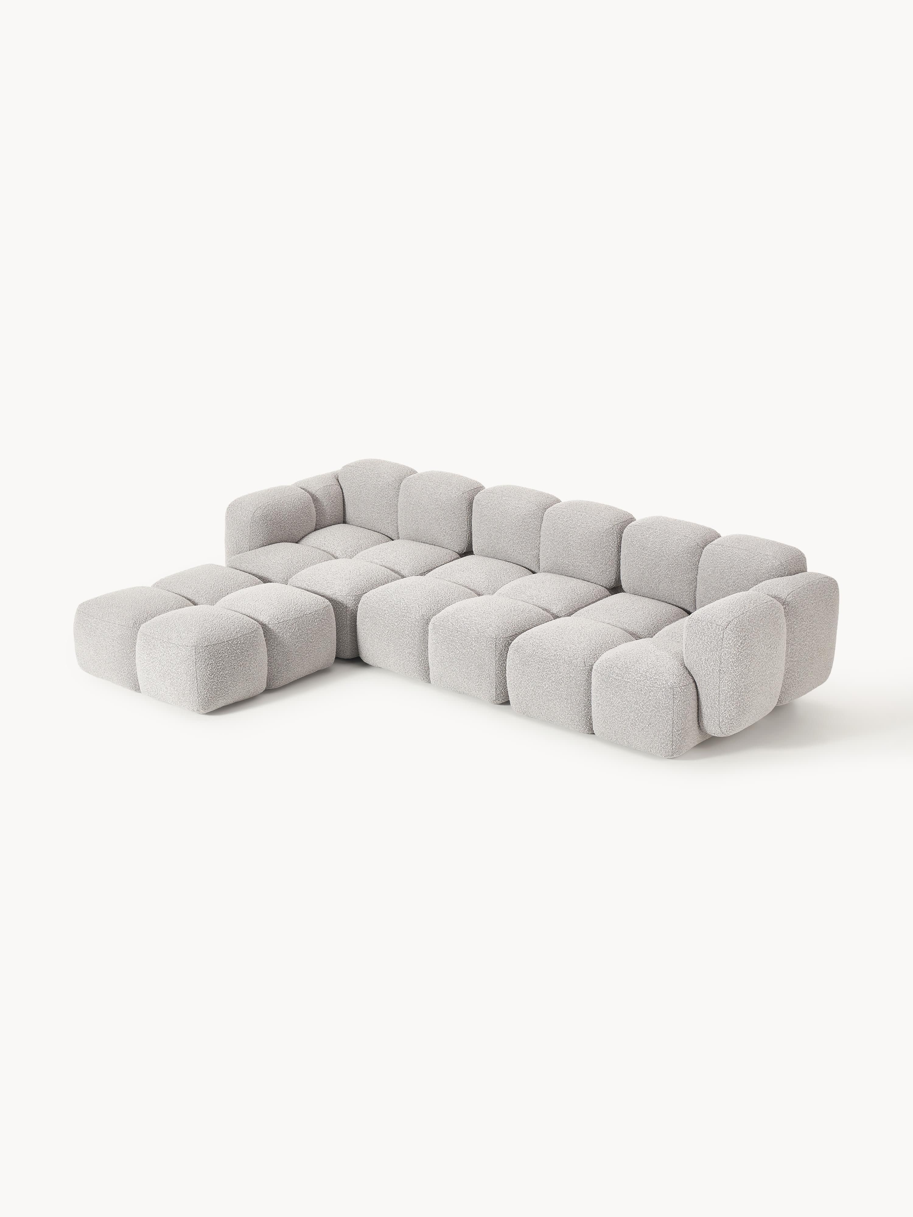 Modulaire bank Tayla (4-zits) van bouclé met poef (links/rechts)