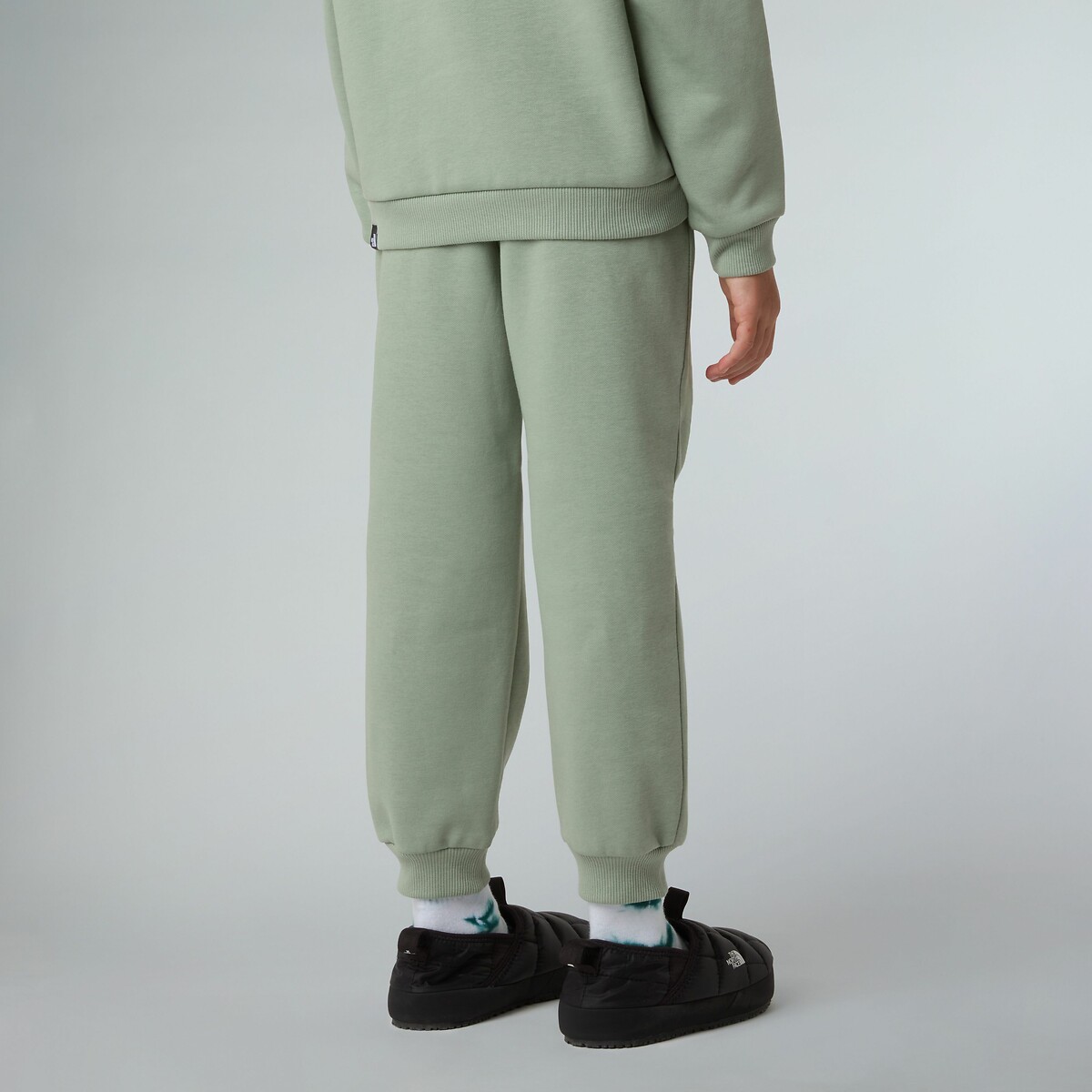 THE NORTH FACE<br>Treino com suéter + broek em molton