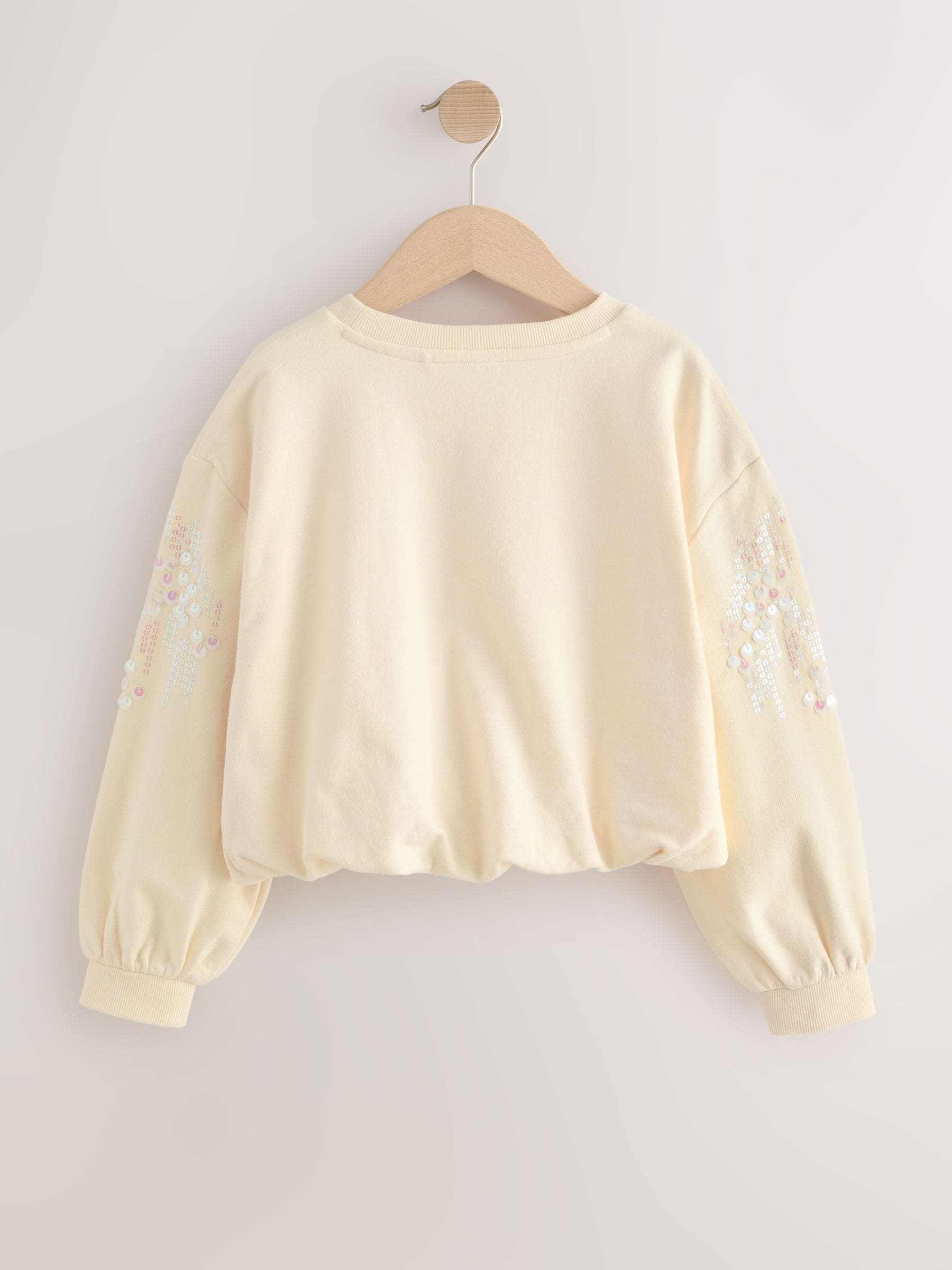 Crème - Sweatshirt met lange mouwen, pailletten en bolle zoom (3-16jr)