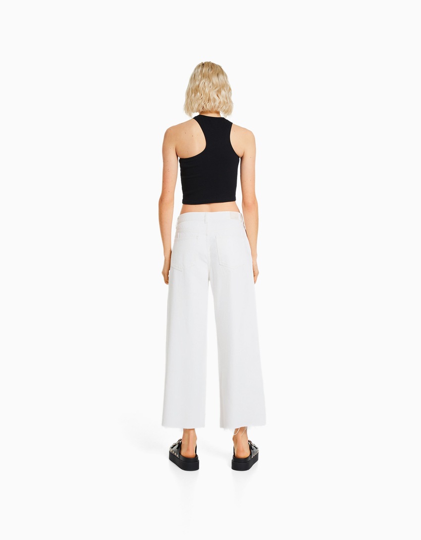 calças jeans cropped de perna larga