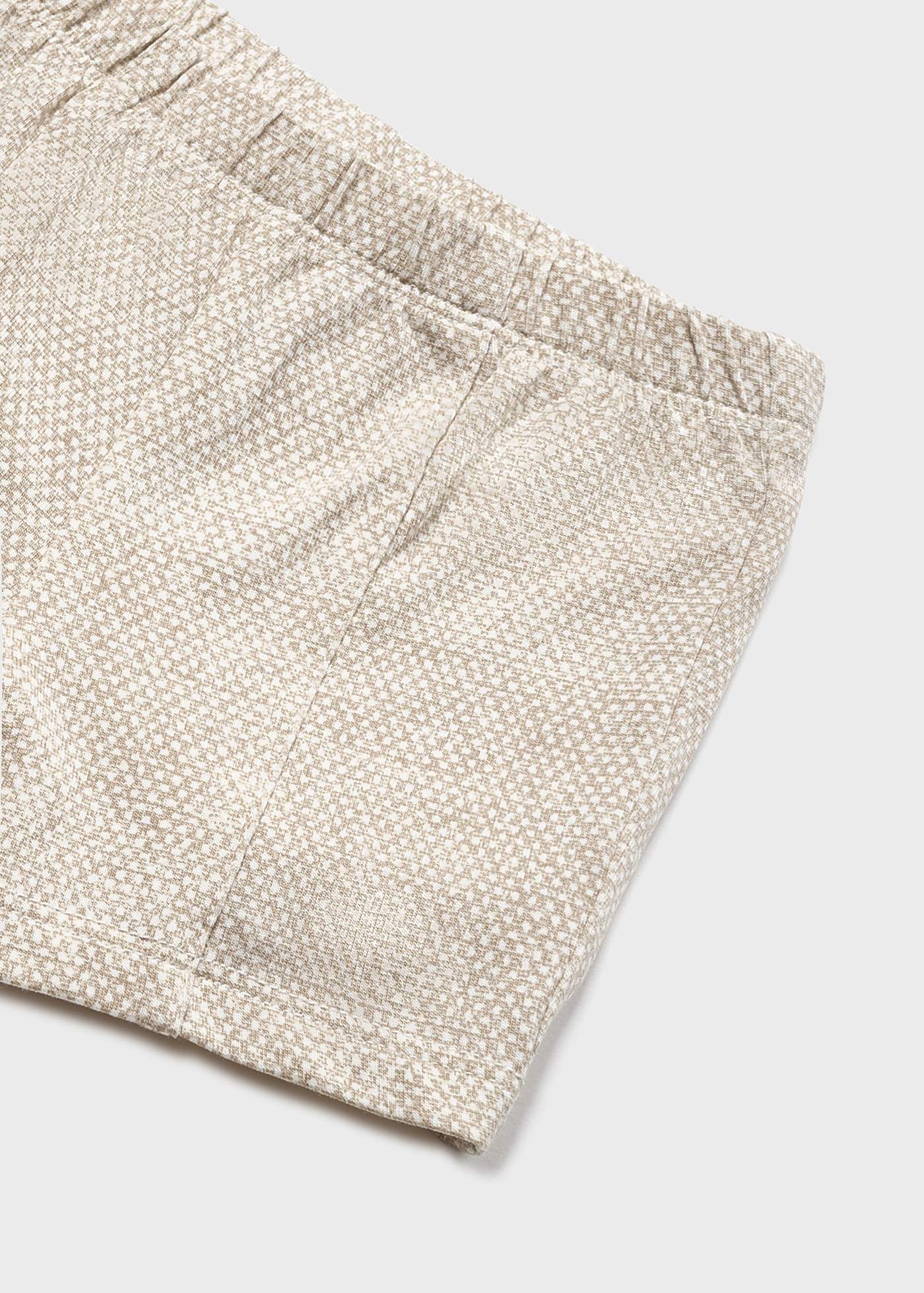 Conjunto de 4 peças em algodão sustentável para recém-nascidos.