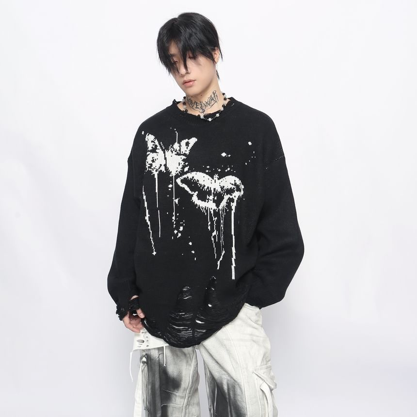 Derbundy - Oversized trui met ronde hals en vlinderprint