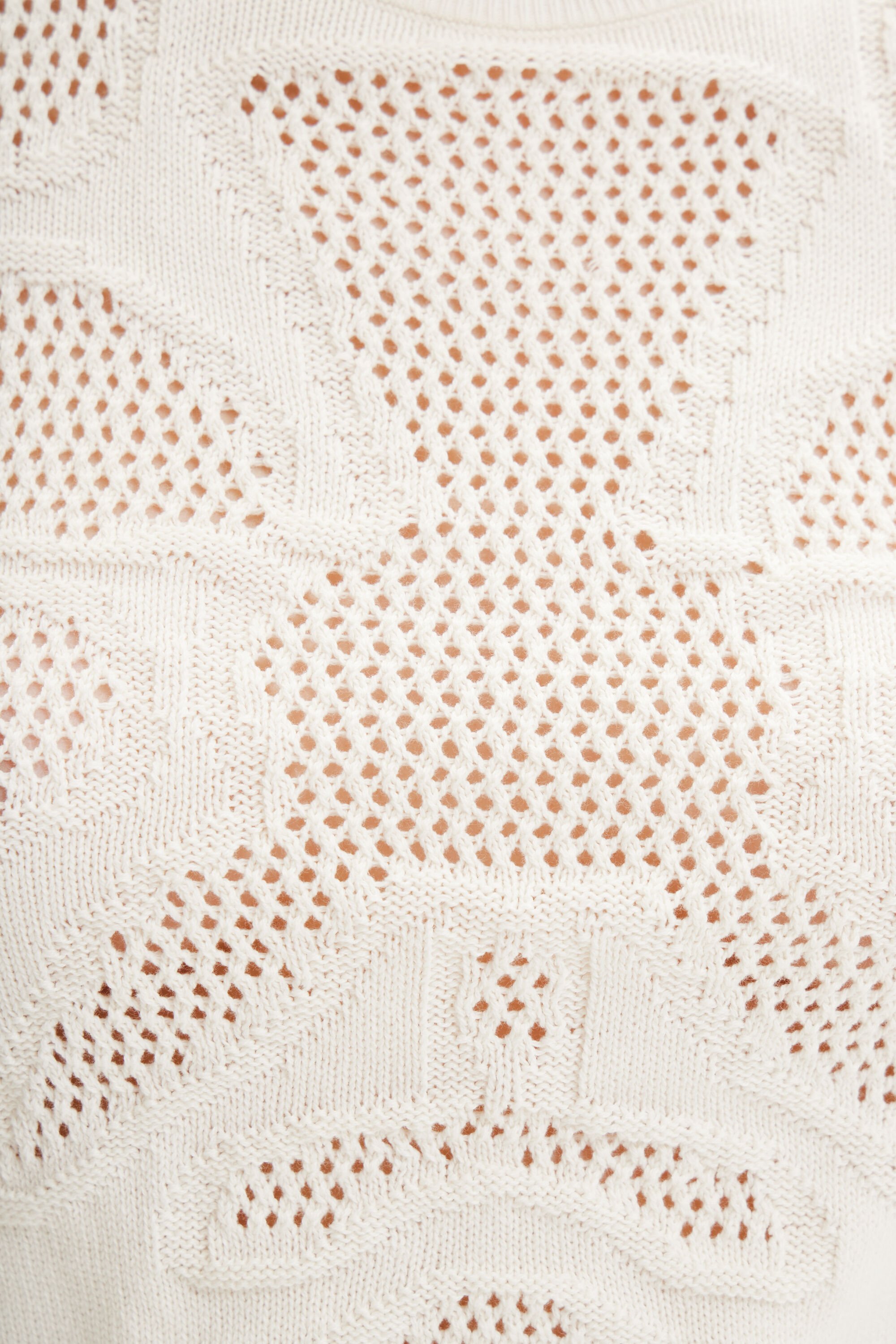 Pull motifs ajourés fleur