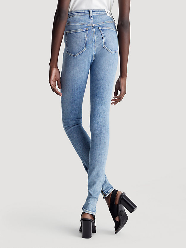 Calça jeans super skinny de cintura alta com zíper na barra
