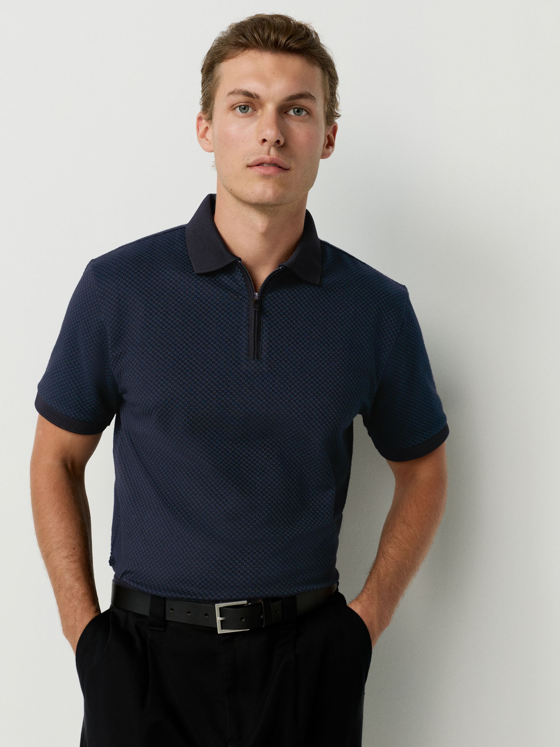 Blauwgroen - Modieus poloshirt met kwartrits