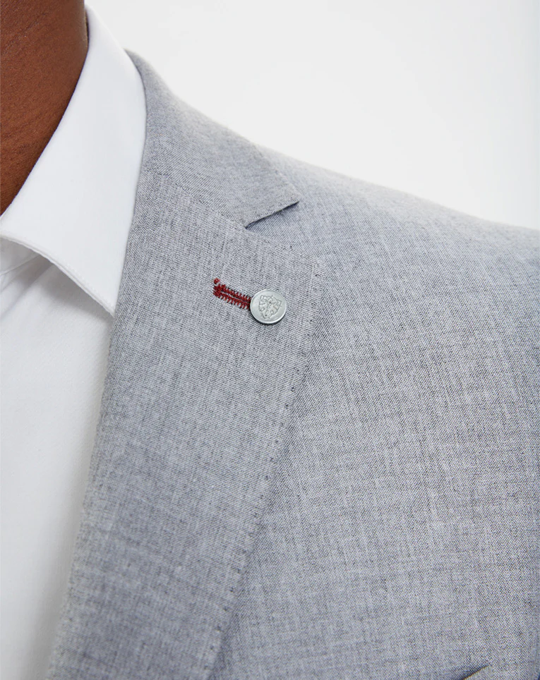 VESTE GRISE AVEC COUDIÈRES