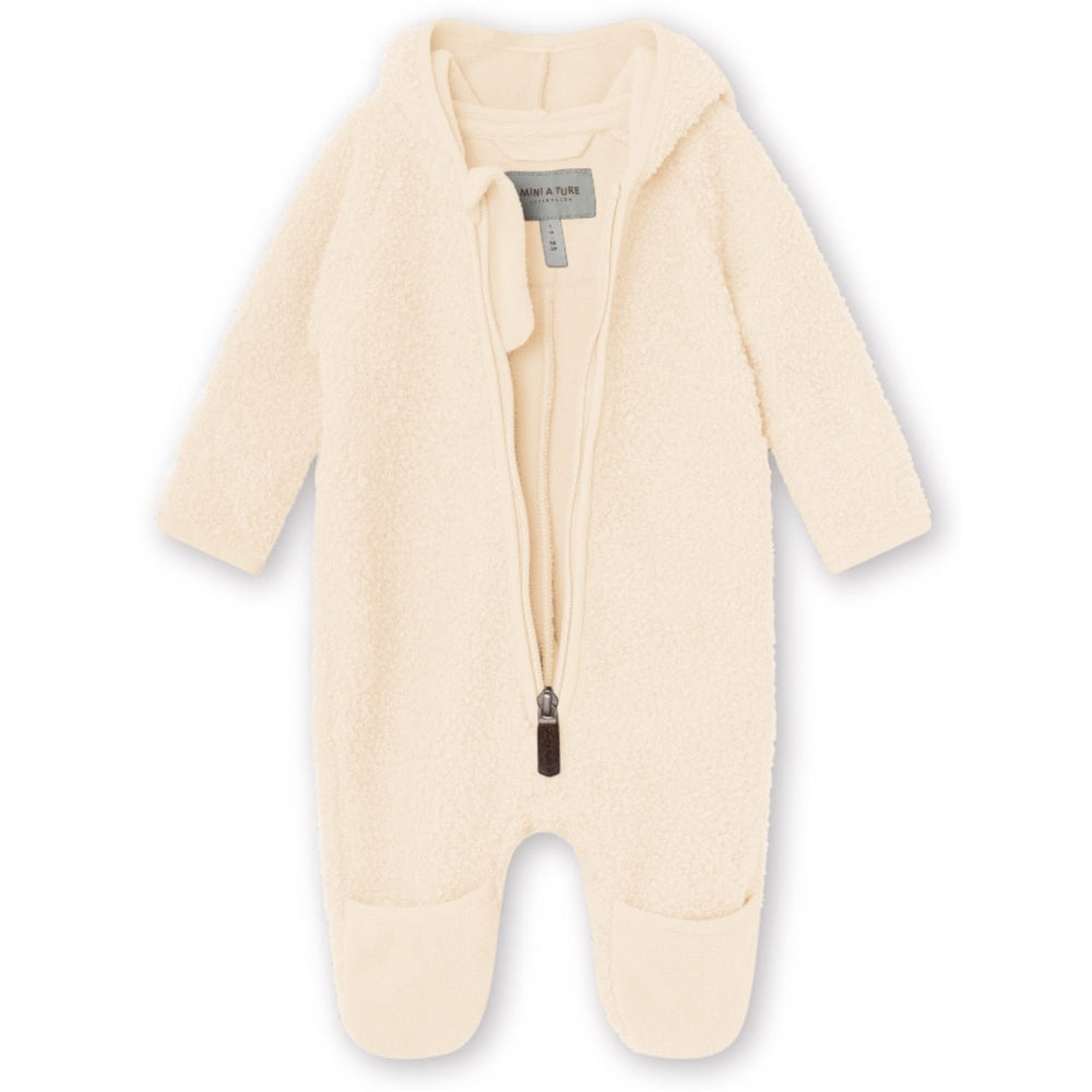 Køb Mini A ture Angora Cream Adel Buksedragt. GRS