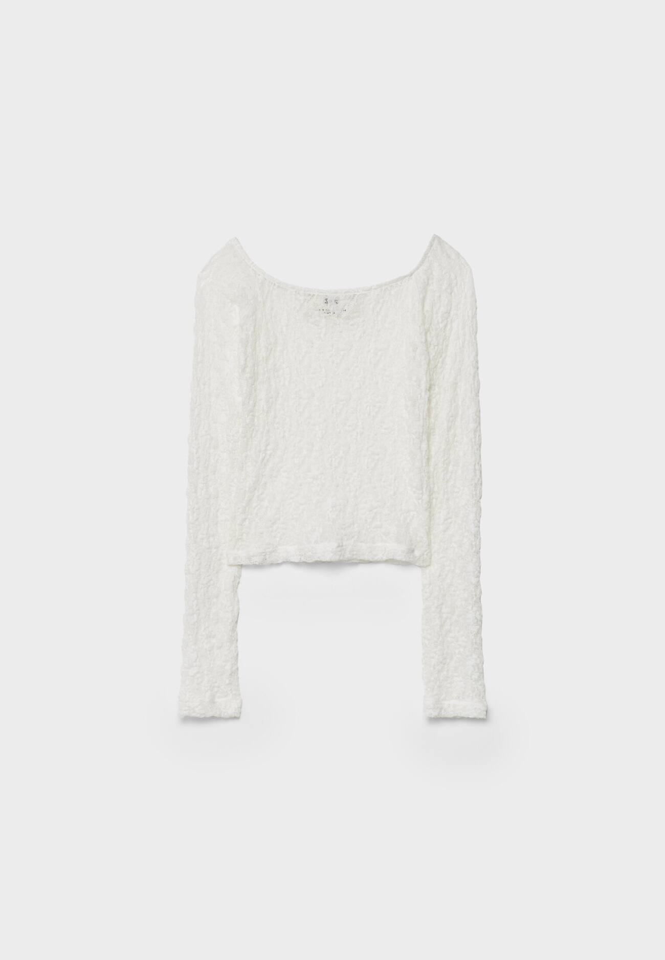 Blusa de renda com ombros à mostra