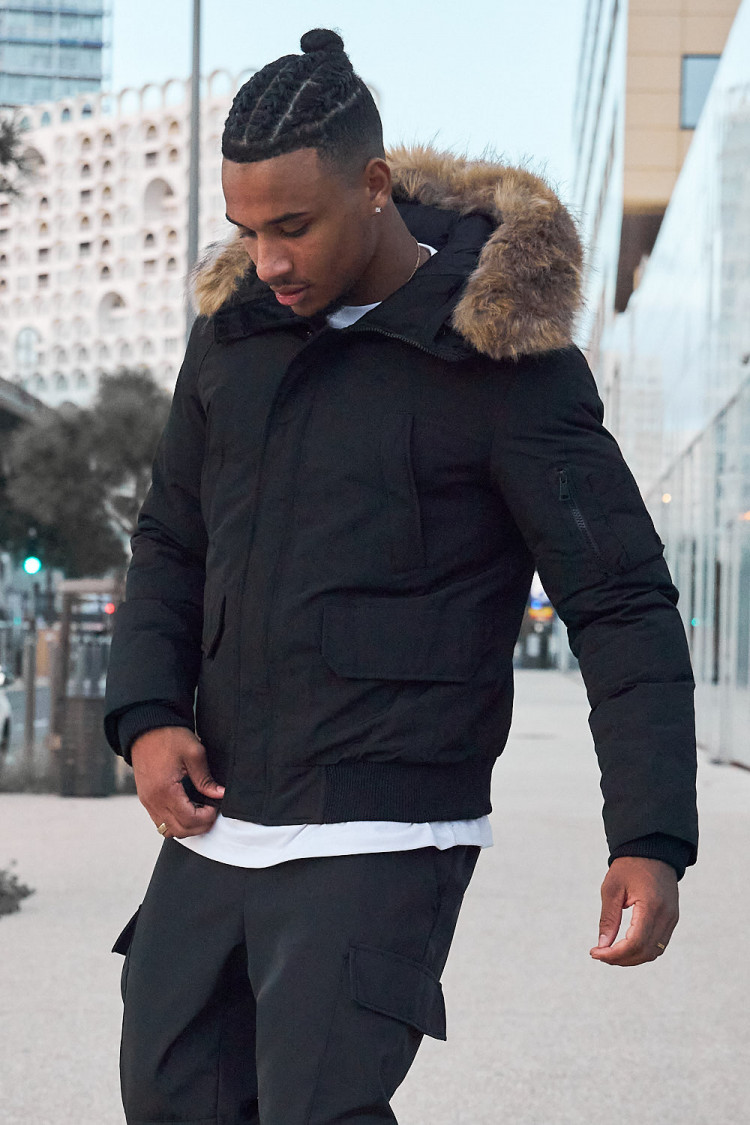 Parka bi-matière noire à capuche en fourrure