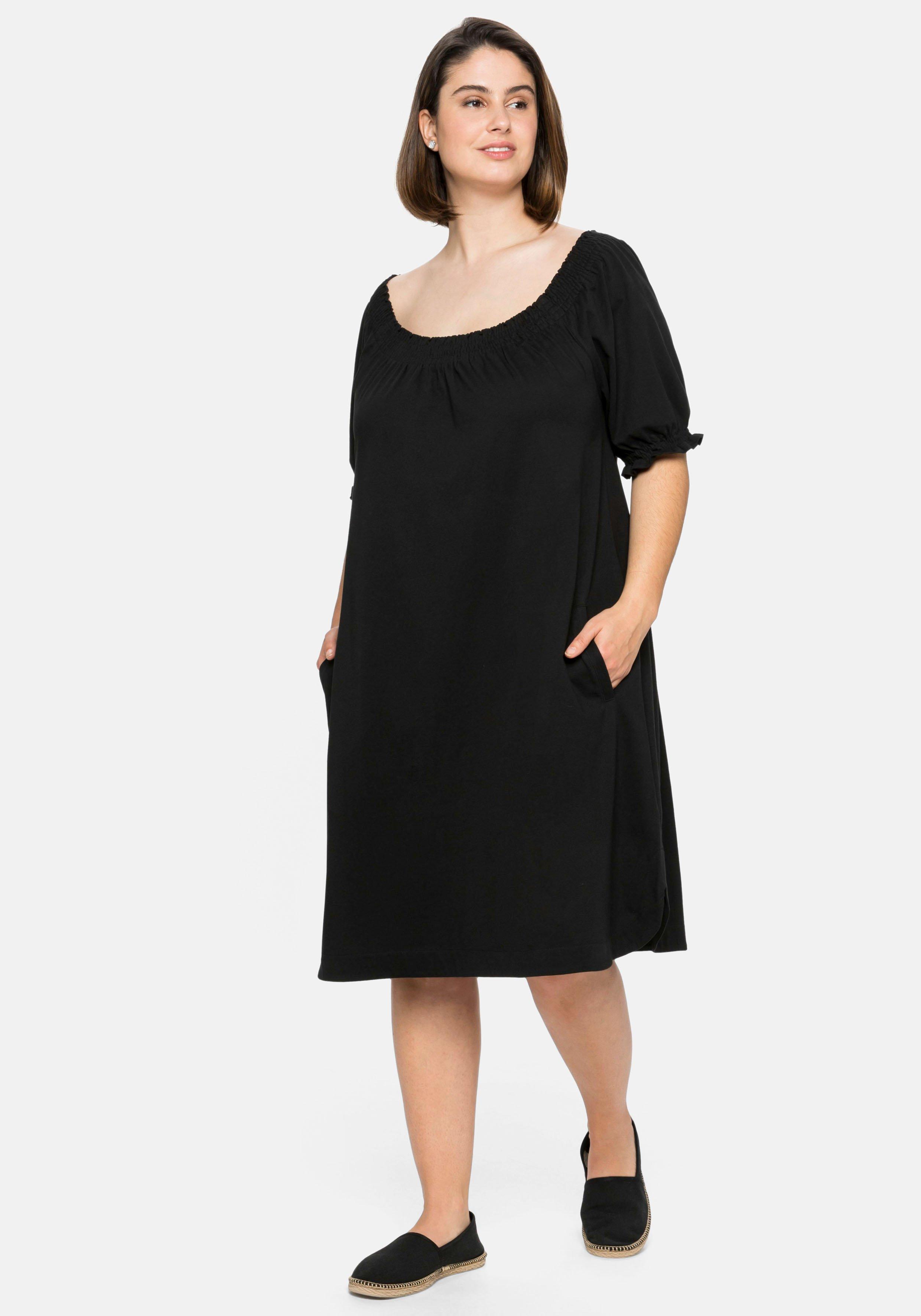 Jerseykleid mit Smok-Ausschnitt und Puffärmeln