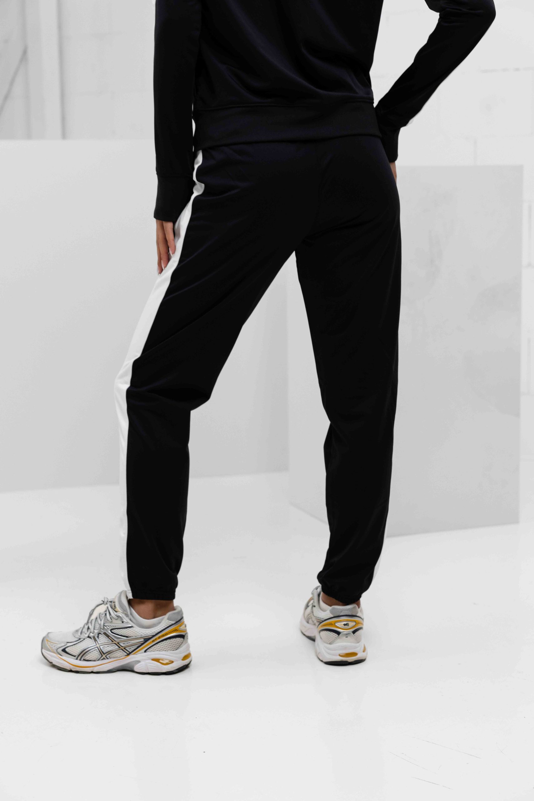 Under Armour Tricot Trainingspak Dames Zwart