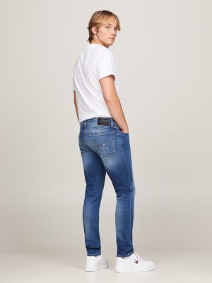 Calça jeans desbotada com corte slim tapered