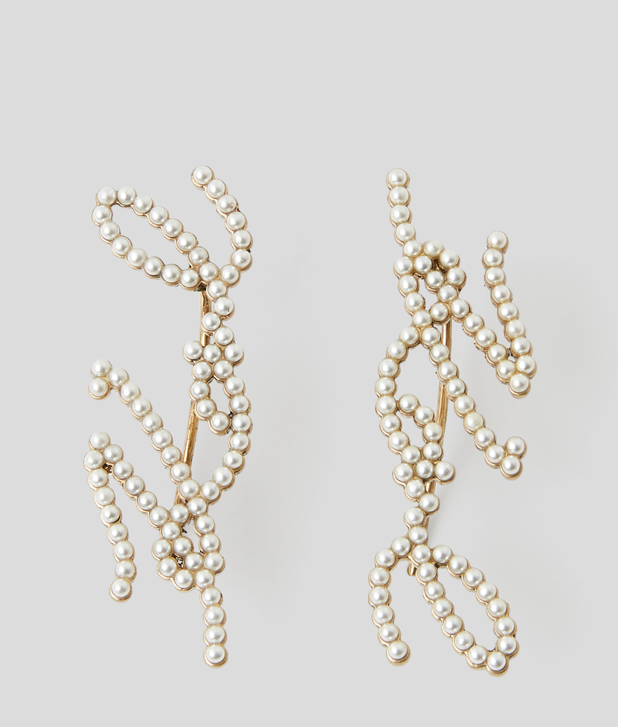 CLOUS D'OREILLES EN PERLES K/SIGNATURE