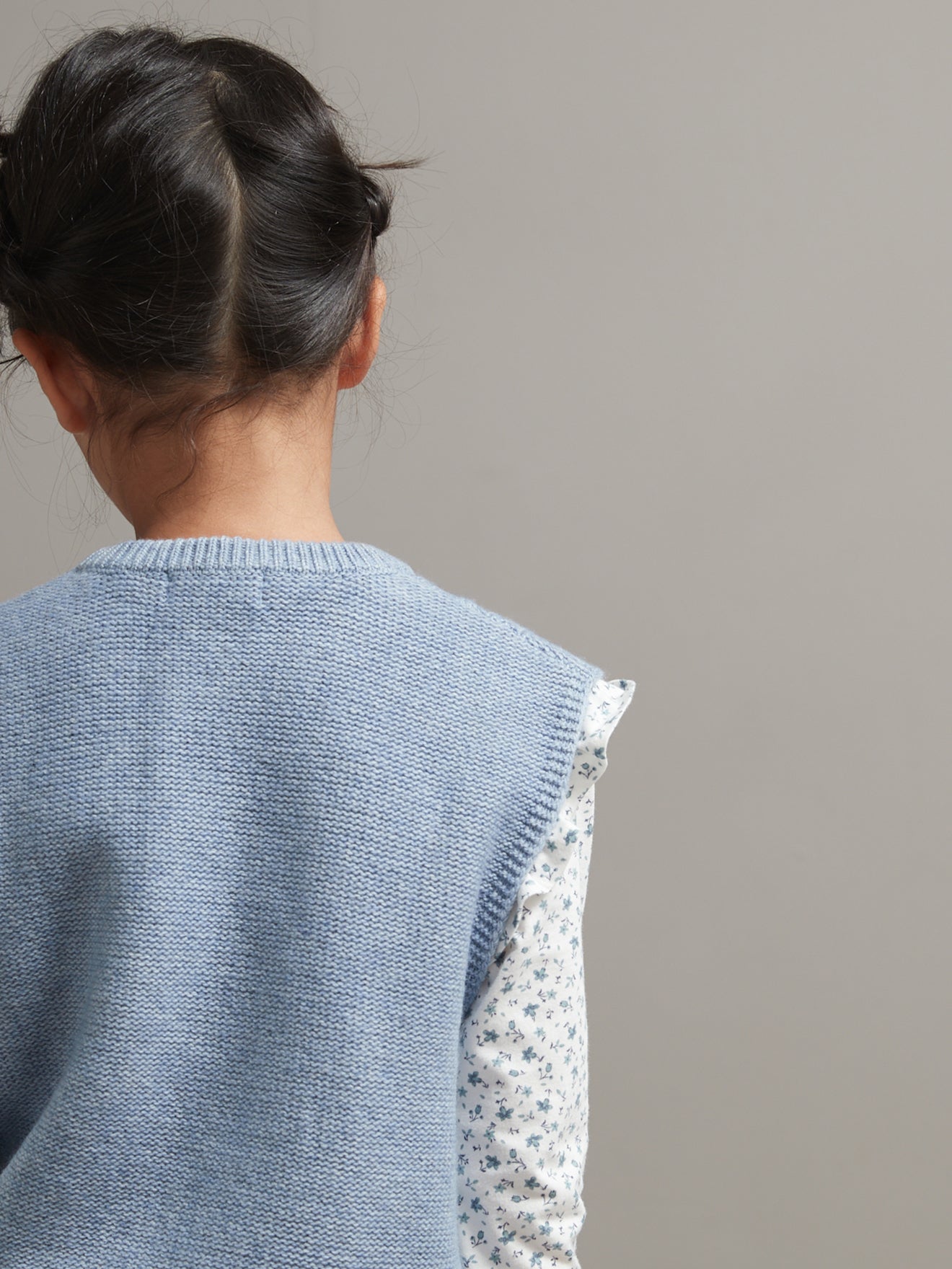 Pull torsadé fille sans manches