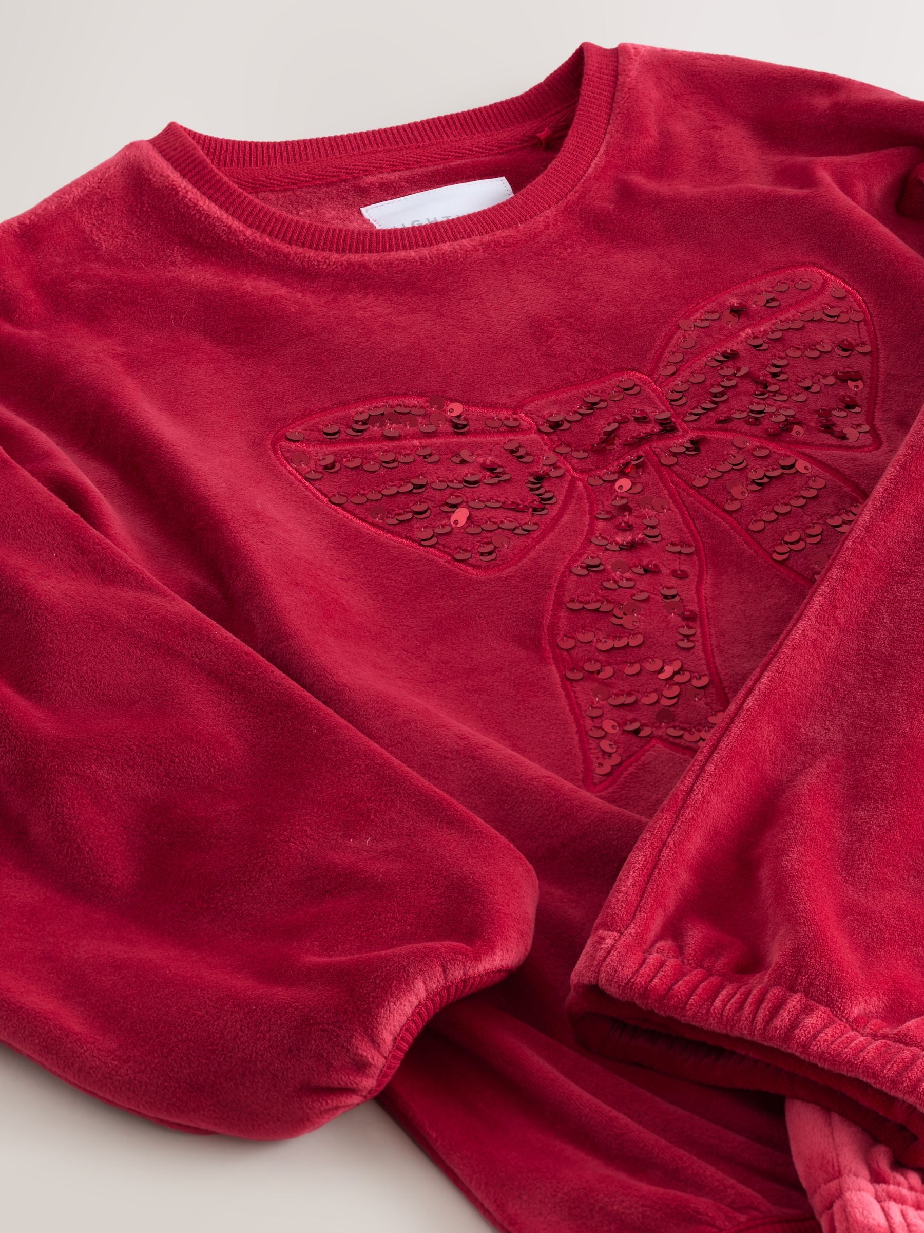 Red Sequin Bow - Behaaglijke fleece pyjama (9 mnd-16 jr)