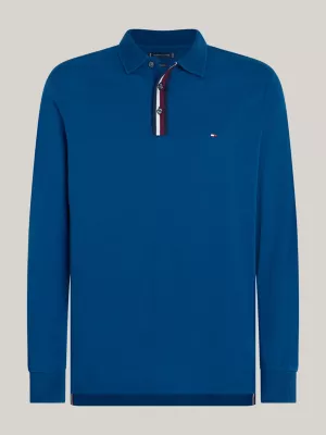 Polo de manga comprida com estampa listrada global e modelagem regular.