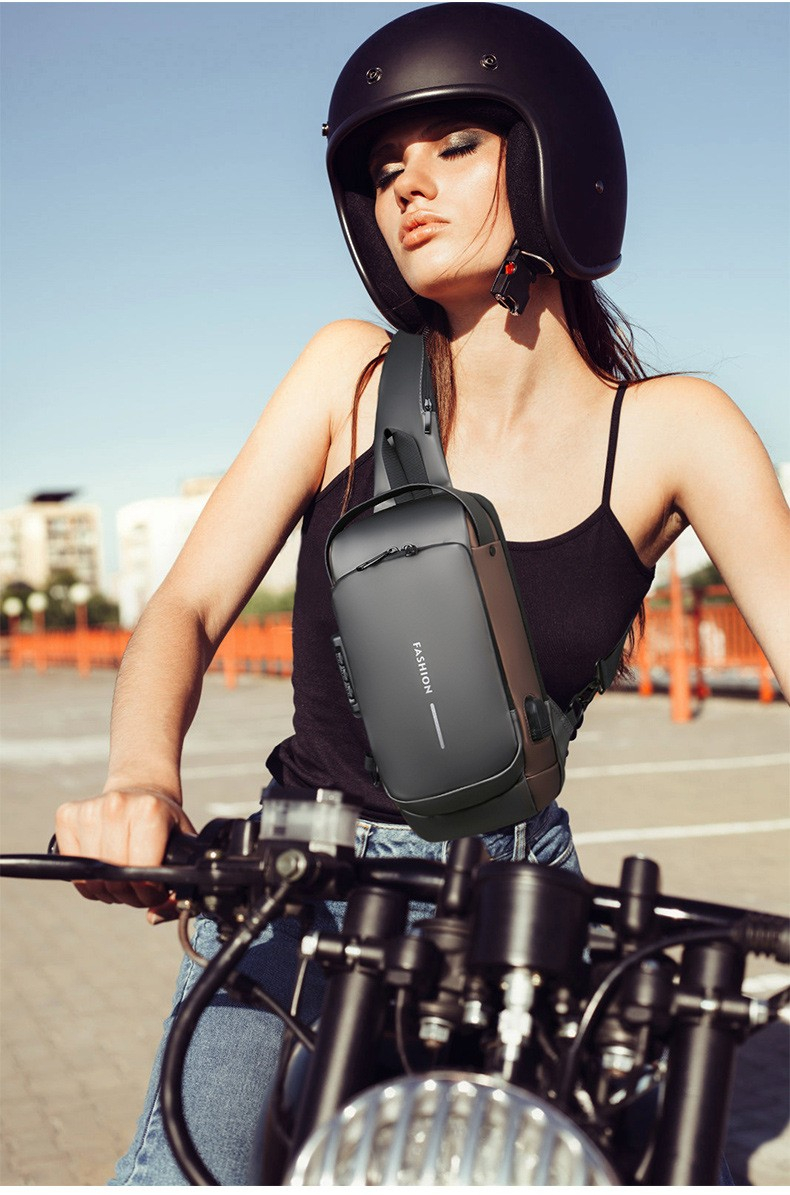 (34x15x9cm) Wasserabweisende Outdoor Schultertasche Anti-Theft Crossbody Bag mit Sicherheitsschloss und USB Port - Schwarz