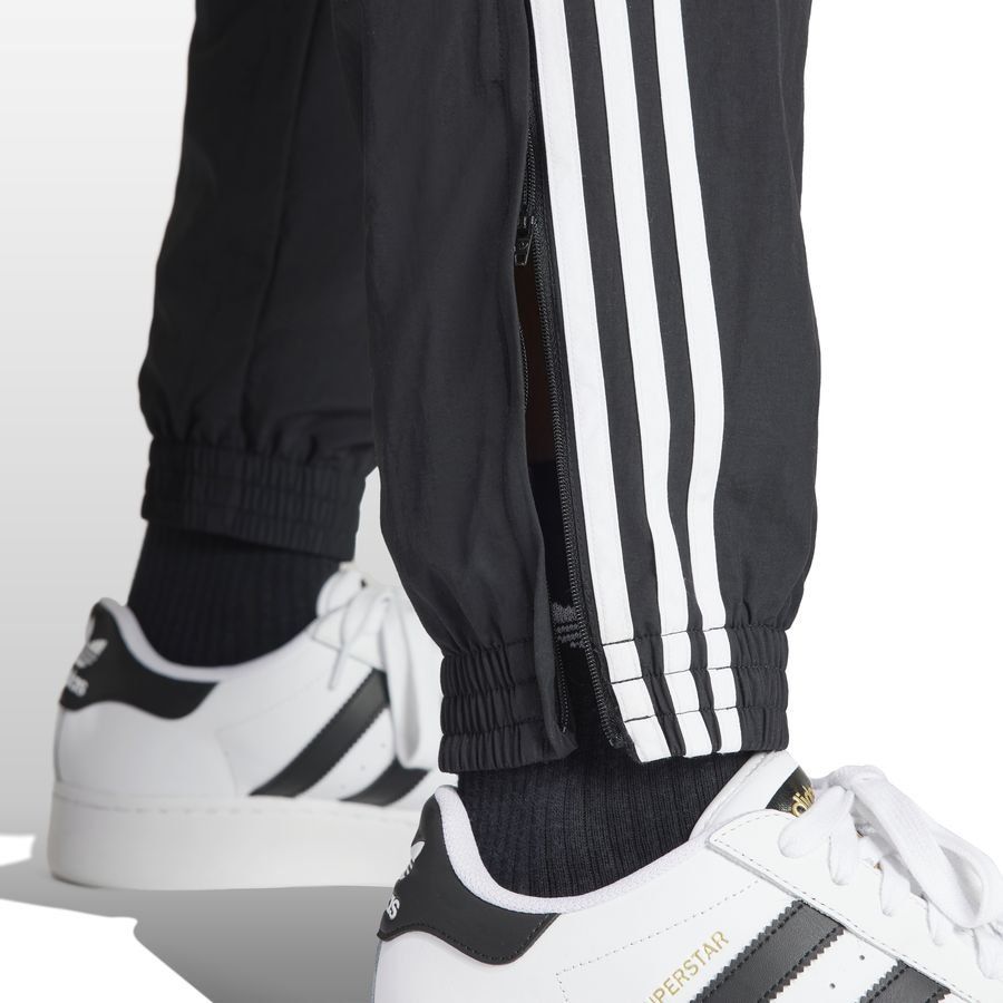adidas Originals Bas de Survêtement Firebird Woven - Noir/Blanc