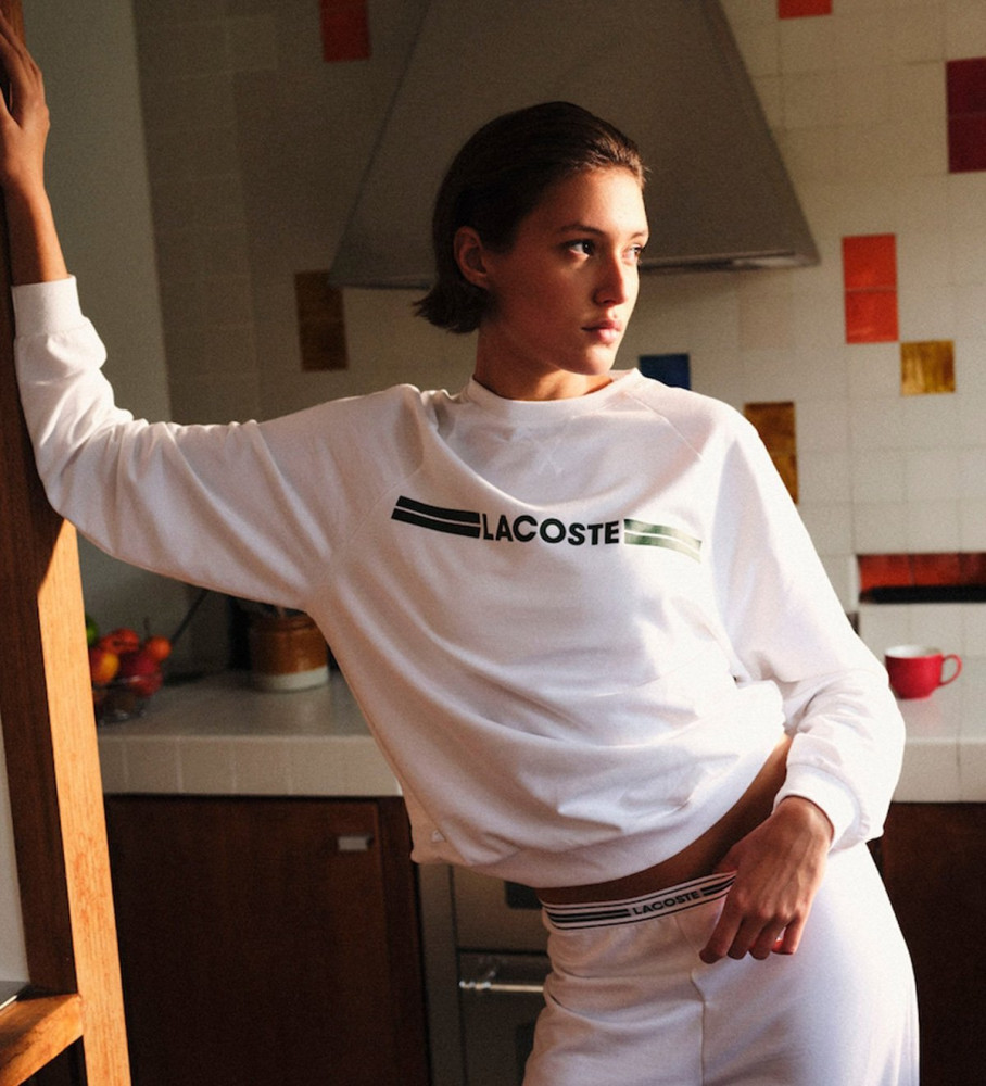 Calças Lacoste brancas de algodão para uso doméstico