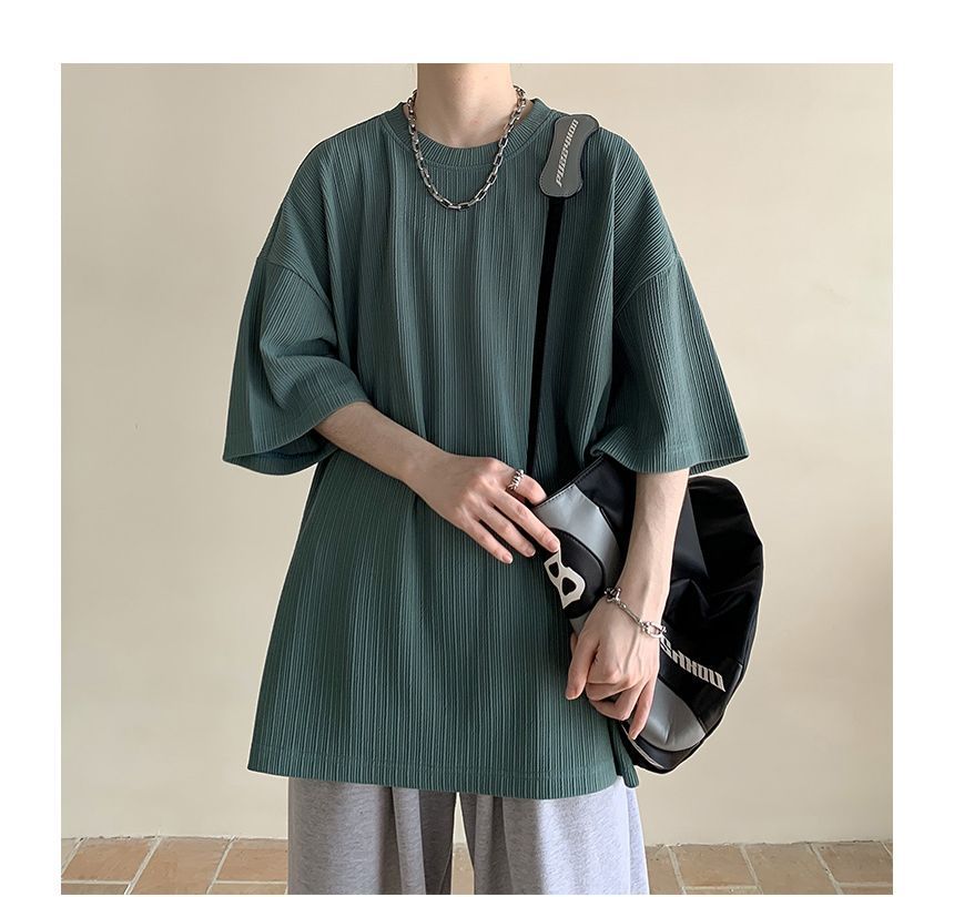 Nightbell - Effen oversized T-shirt met ronde hals en elleboogmouwen