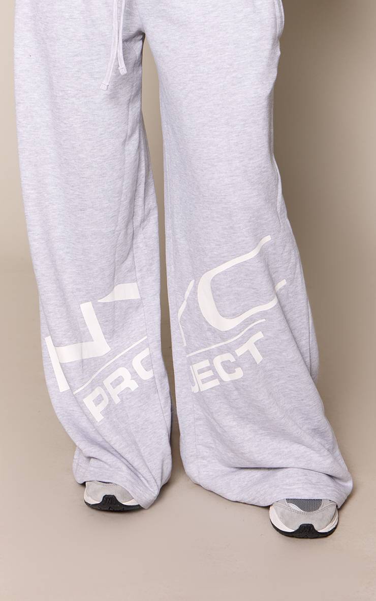 Gris Cendré Jogging Petite Taille Basse À Jambes Larges Avec Détails Graphiques
