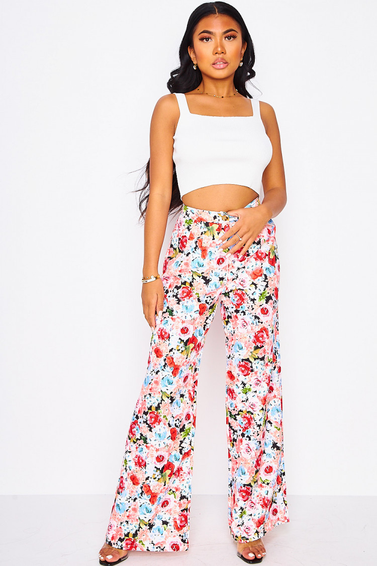 Pantalon à pinces rose imprimé fleuri