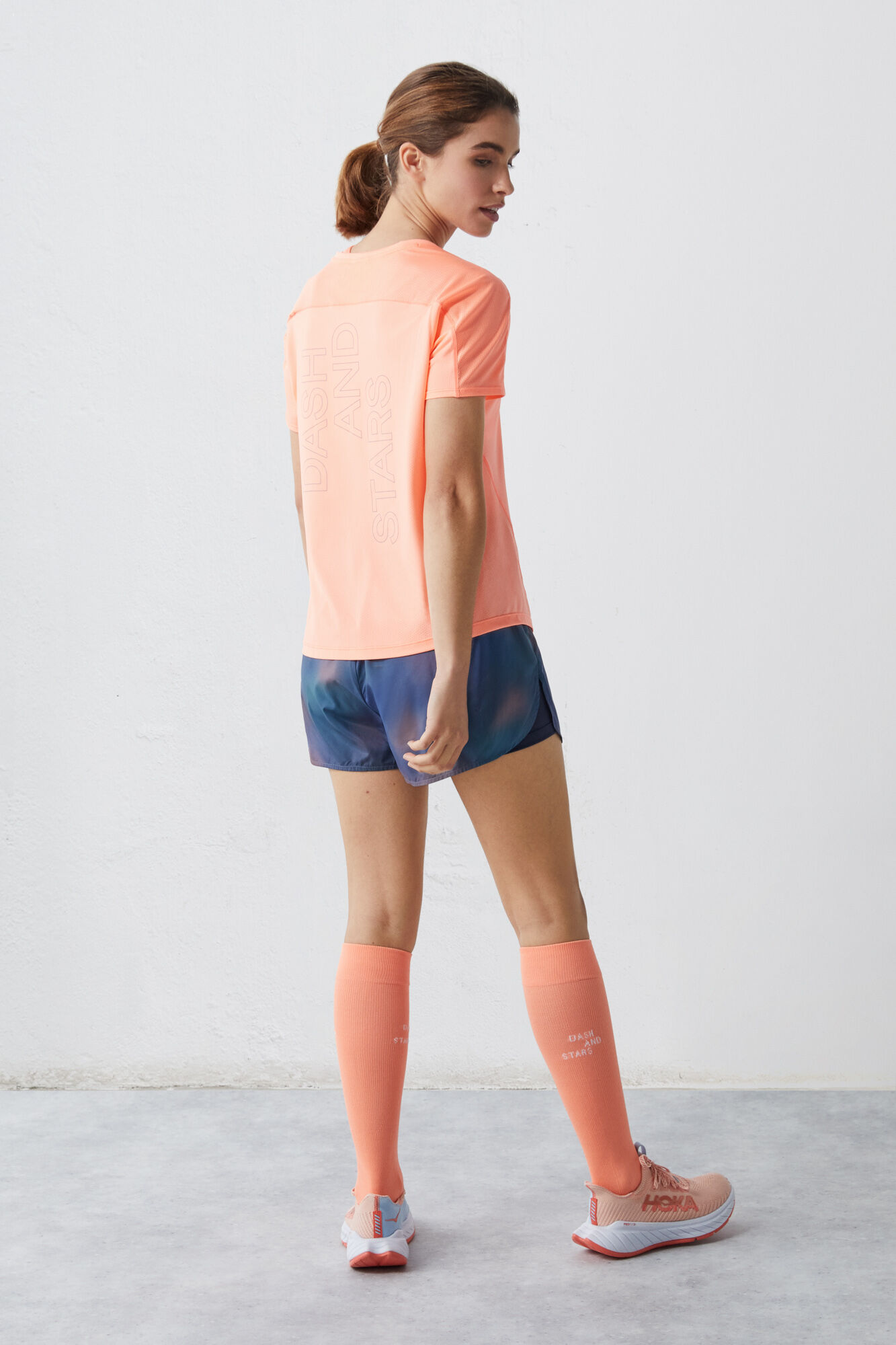 Camiseta técnica respirável laranja-avermelhada