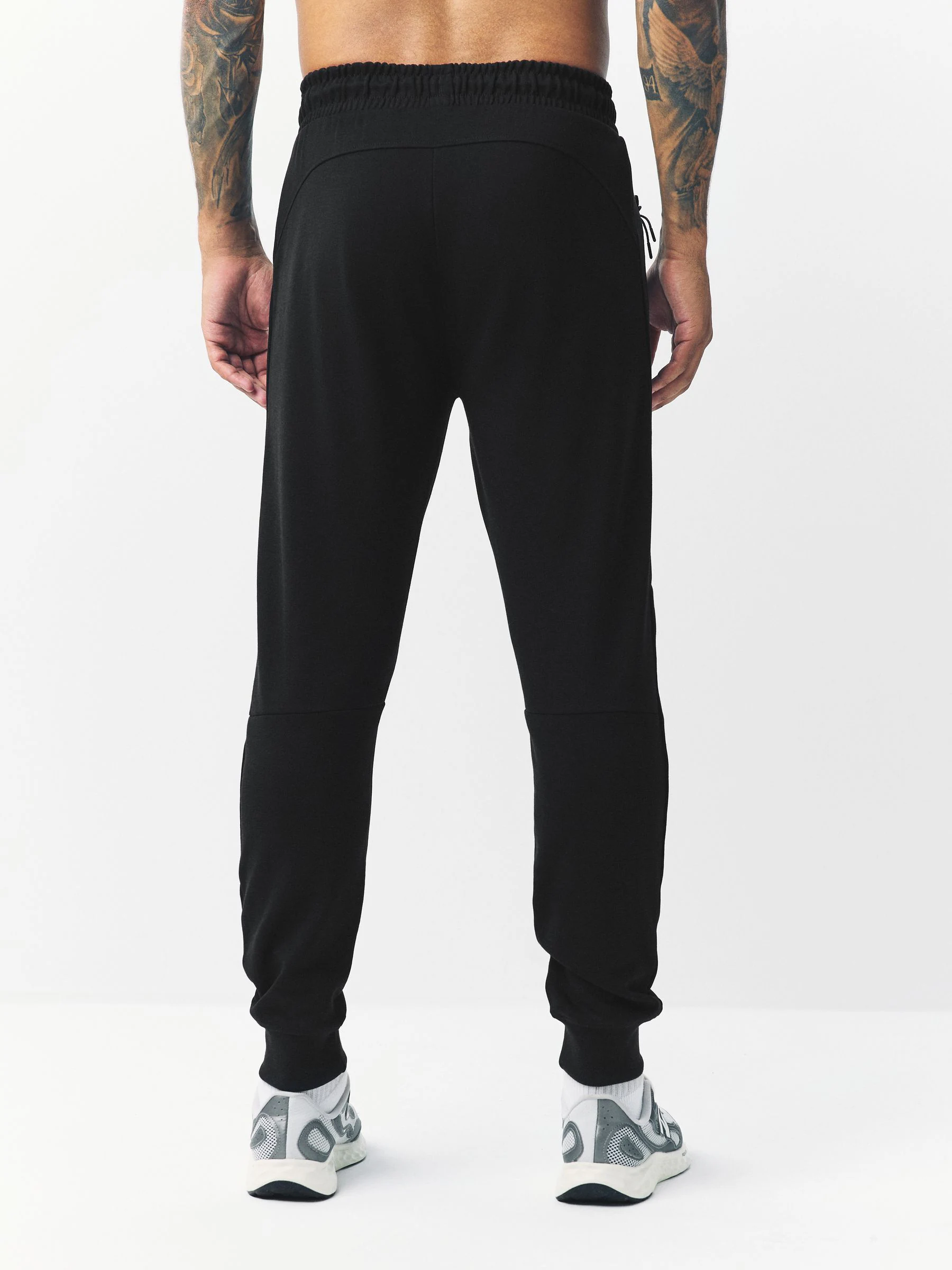 Zwart - Sport- en vrijetijdsjoggingbroek met boorden