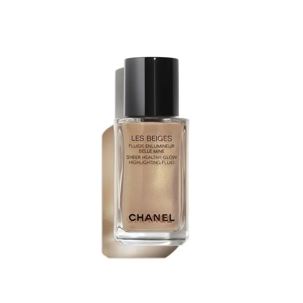 CHANEL - LES BEIGES FLUIDE ENLUMINEUR BELLE MINE FLUIDE ENLUMINEUR DE TEINT EFFET IRISÉ. BELLE MINE LUMINEUSE. VISAGE ET CORPS.- Illuminateur