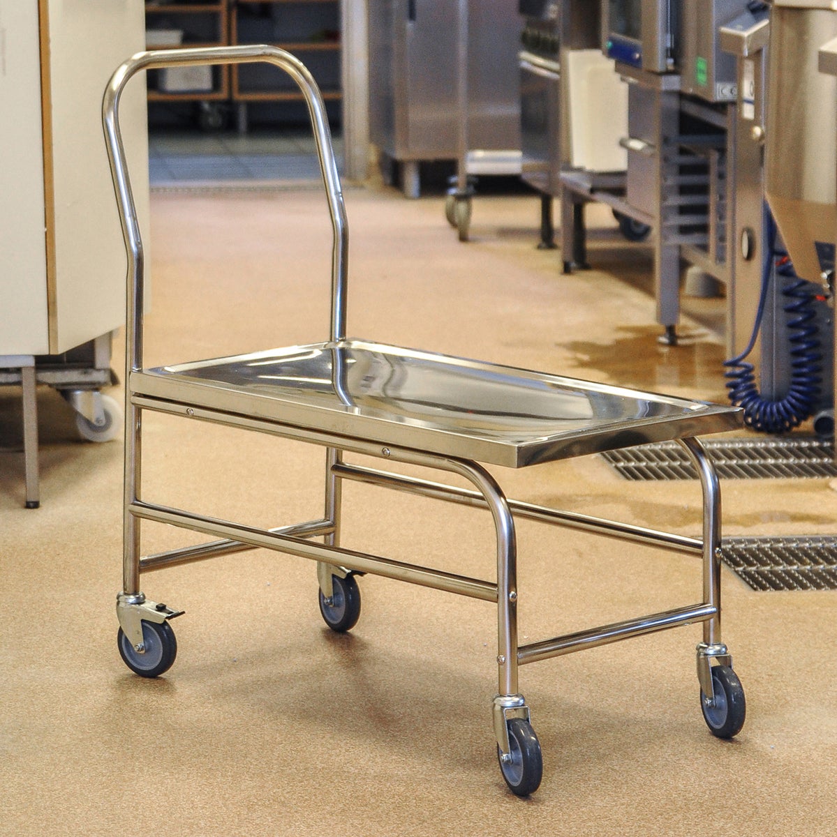 Kongamek roestvrijstalen platformwagen met duwbeugel en rem, laadvlak 760x440mm, rubberen banden