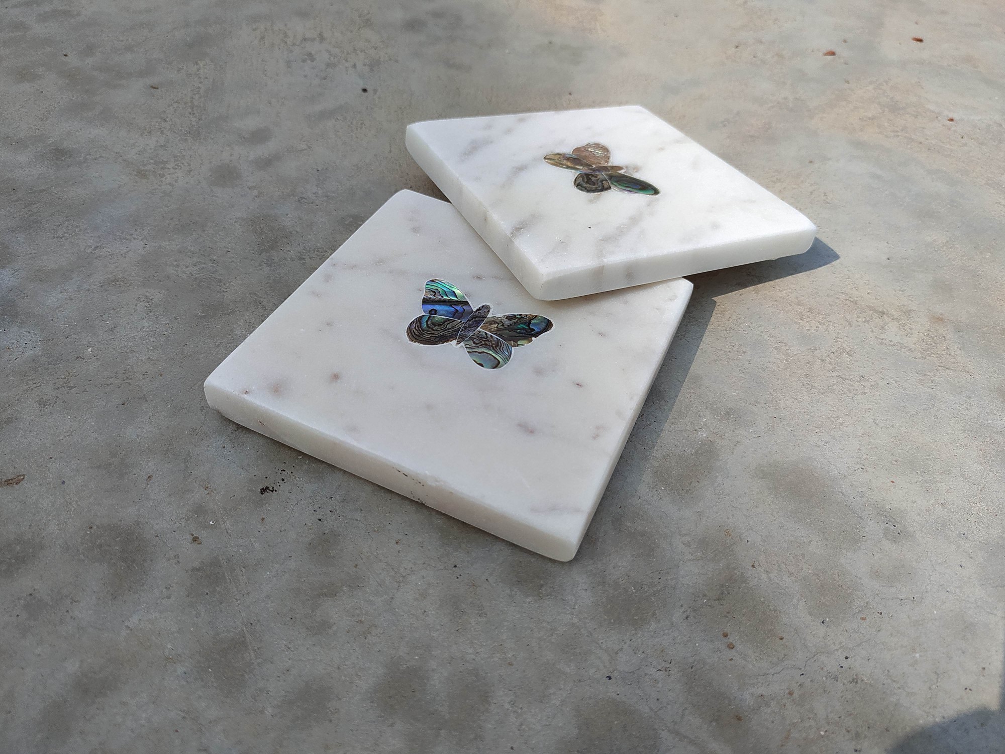 Marmor-Untersetzer 'Schmetterling', weiß, T 10 cm, B 10 cm, H 1-2 cm zu 5,80