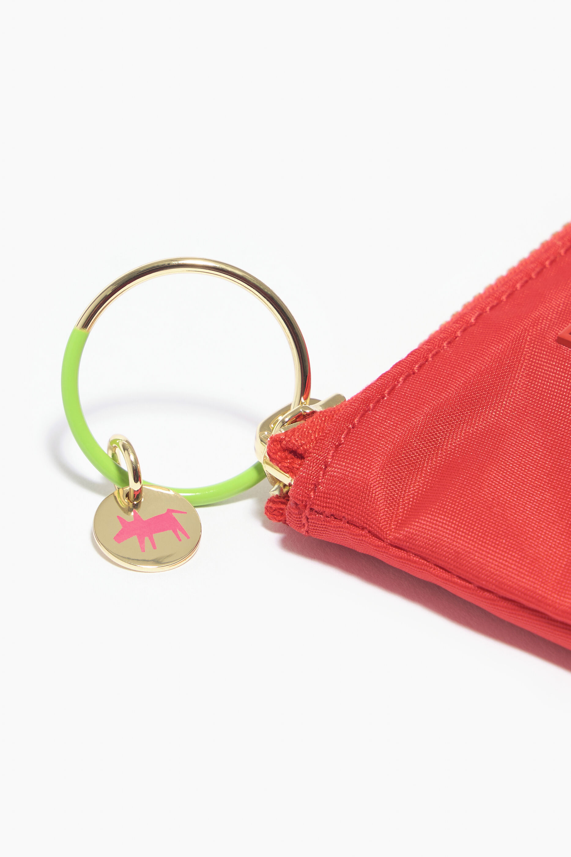 Porta-moedas curvo em náilon vermelho