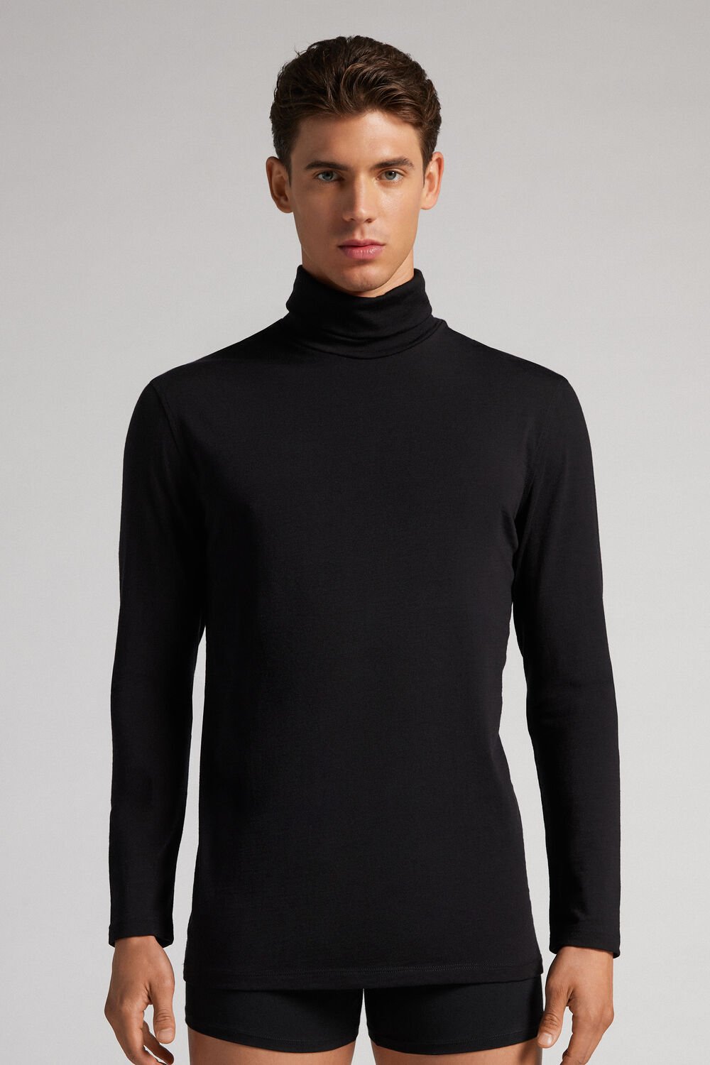 Blusa de lã merino de manga comprida e gola alta
