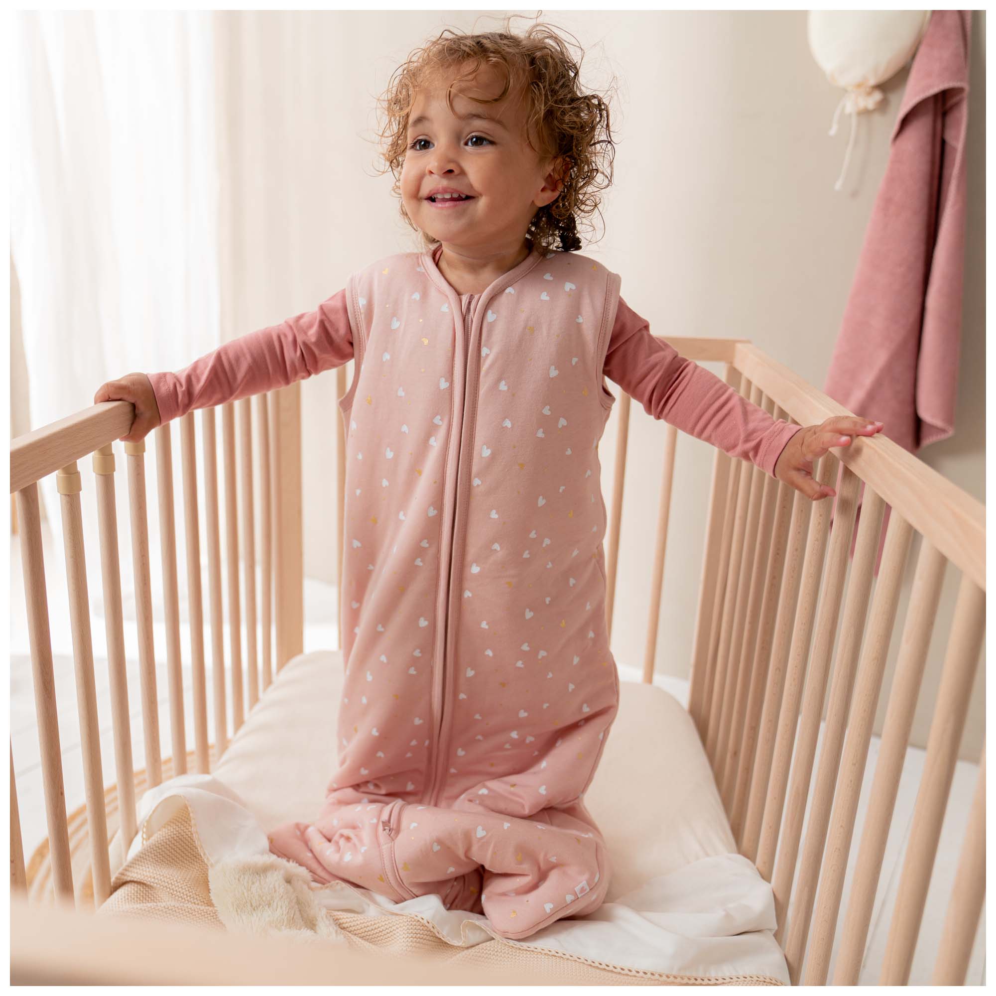 Prénatal slaapzak hartjes roze