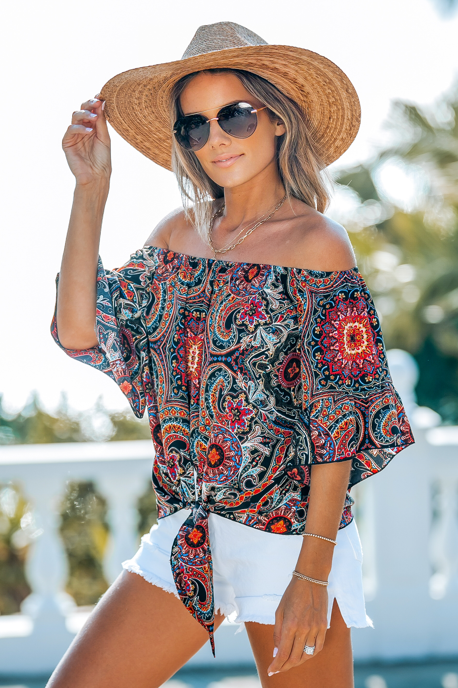 Blouse à épaules dénudées et volants boho