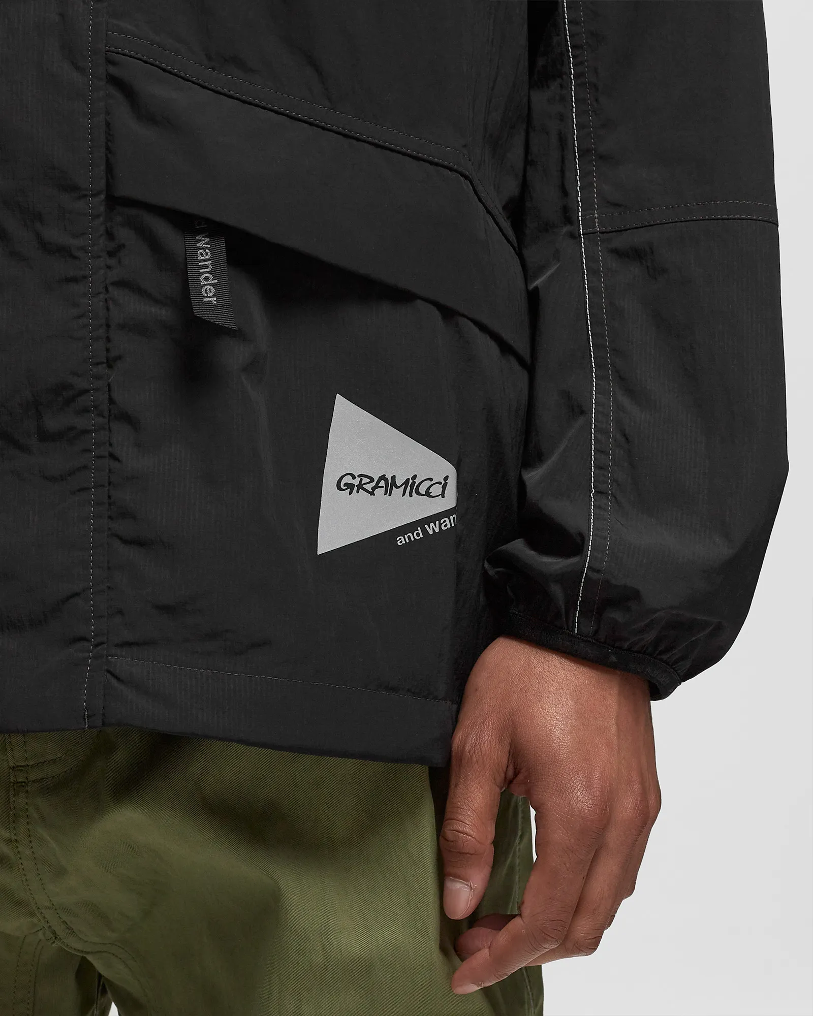 Gramicci x AND WANDER PATCHWORK WIND HOODIE