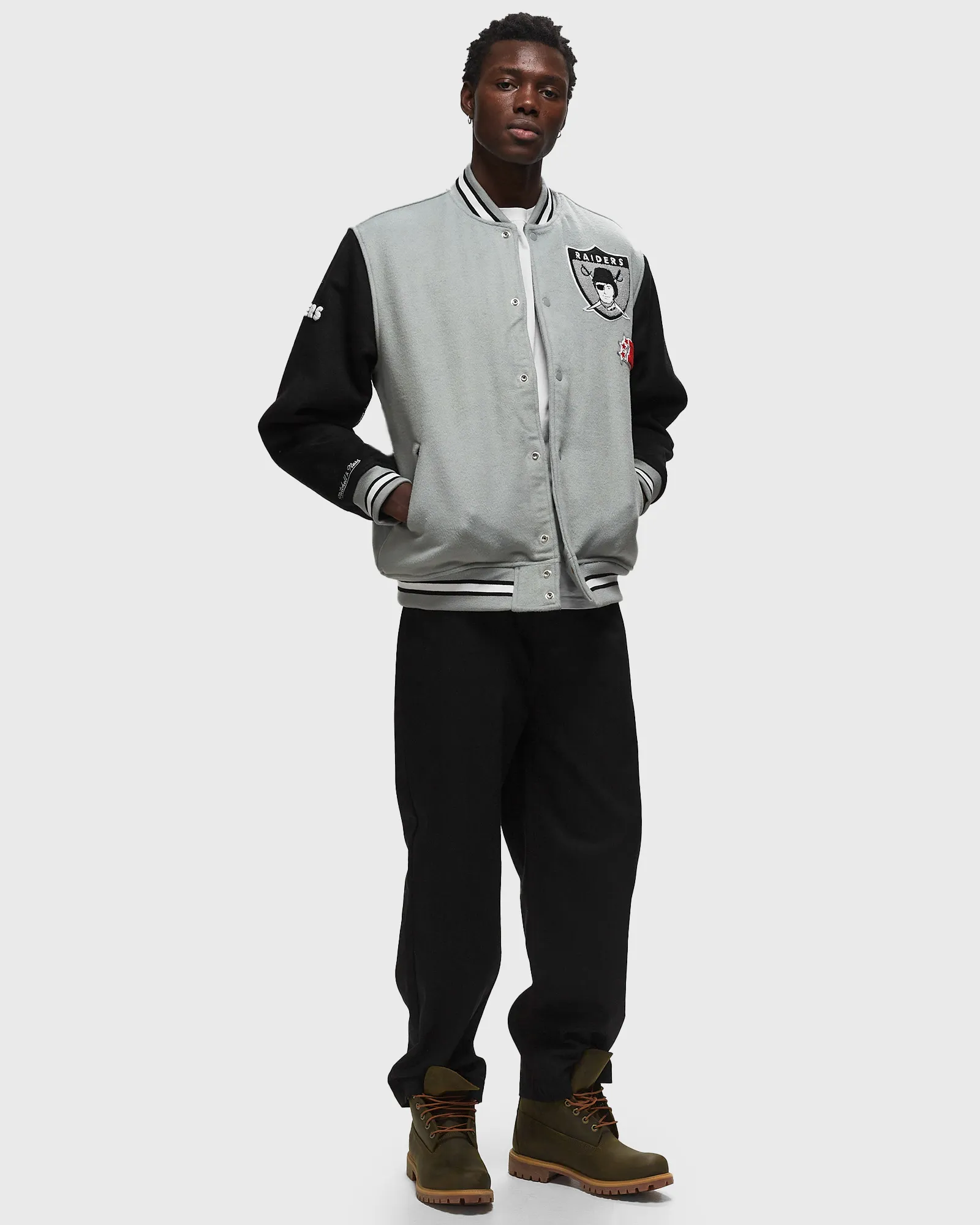 Jaqueta universitária Mitchell & Ness NFL Team Legacy Oakland Raiders