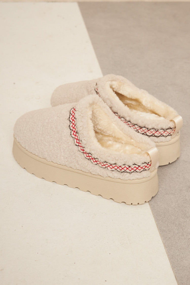Bottines chaussons en peau de mouton compensés beige