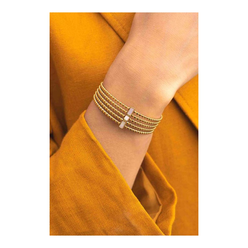Bracelet rigide en acier doré orné de pierre naturelle blanche